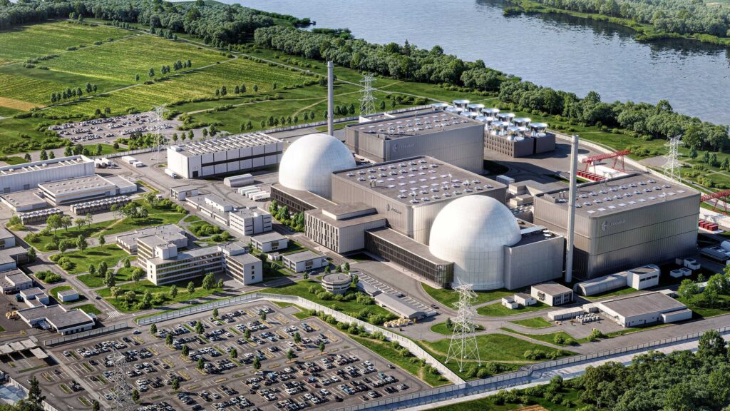 Visualisierung eines Kraftwerksgeländes von „Focused Energy“ aus der Vogelperspektive: zwei weiße Kuppelgebäude und große graue Hallen, davor ein großer Parkplatz und Grünflächen.